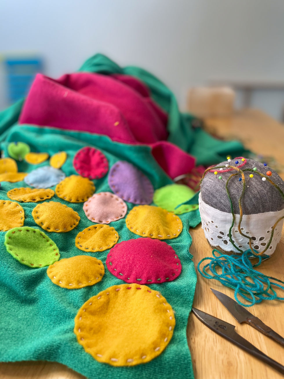 Close-up detail of stitching and materials from a garment created during the RfCC project.