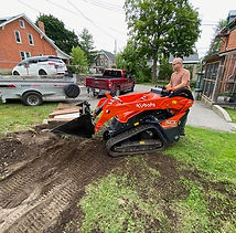 Removing Old Patio with Mini Skid