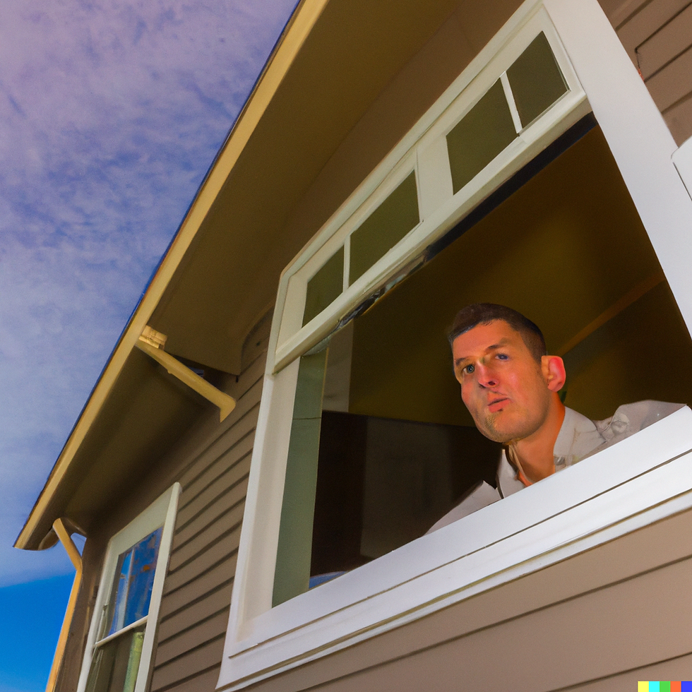 a guy looking out a window.