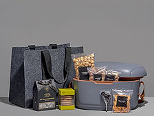 NEXYATEC branded promotional cooler hampers used for corporate gifting, events, and client engagement