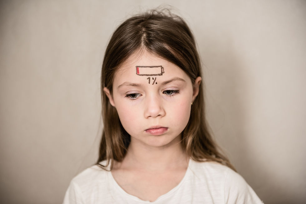 A little girl with a drained battery icon on her forehead