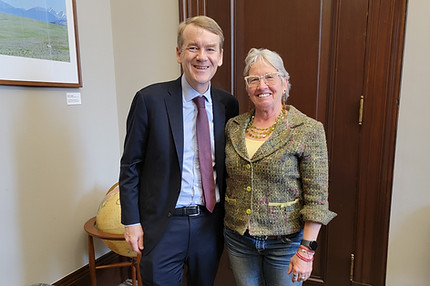 Saguache County Commissioner Liza Marron with U.S. Senator Michael Bennet.