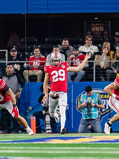 Jesse Mirco punting in the Cotton Bowl while playing for Ohio State, now at THE ARMORY in Columbus, Ohio