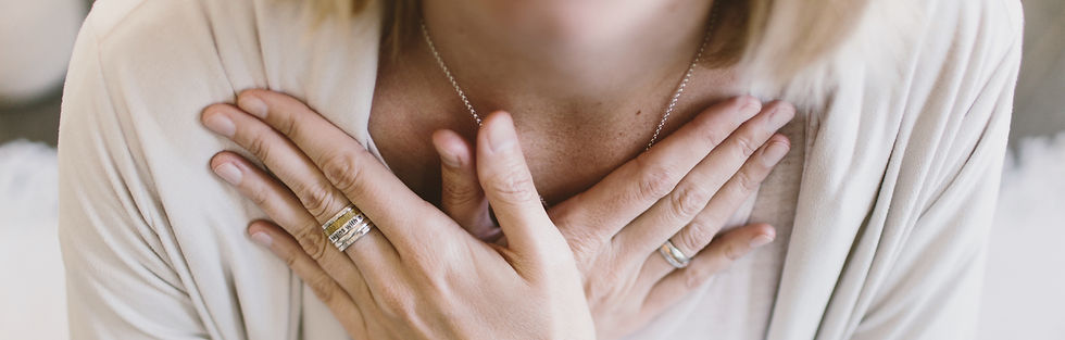 Person with hands crossed over their chest