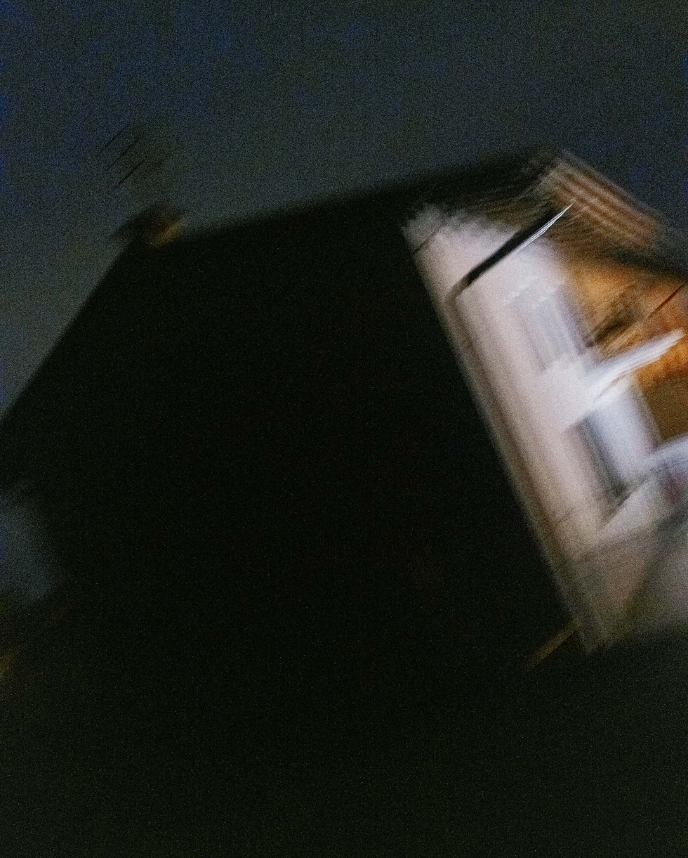 Blurry view of a house at night