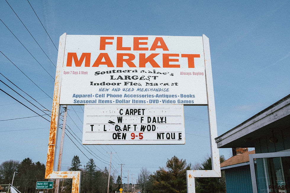 Flea Market Maine sign: Maine's largest covered market, now abandoned.