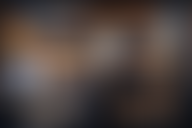 Locksmith repairing a commercial door lock for a business near Downtown Lake Worth Beach