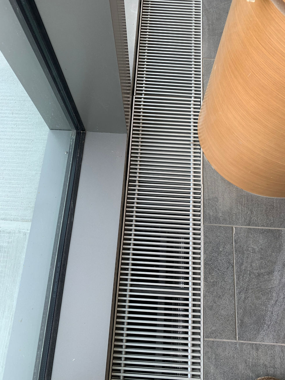 Hot Water Trench Radiation with Roll-Up Grilles