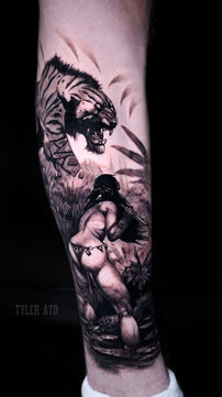 Frank Frazetta Fantasy Warrior Tiger Black and Grey Tattoo by TylerATD Death Proof Tattoo and Barber. Whistler, BC. Pemberton, Squamish, Vancouver Canada. Tattoo Studio Shop Barber Shop. Tattoo Artist. Professional Services. TylerATD