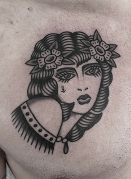 Rose Lady American Traditional Tattoo Trad Tattoo Black and Grey by Erik Jeffrey. Death Proof Tattoo and Barber. Whistler, BC. Pemberton, Squamish, Vancouver Canada. Tattoo Studio. Tattoo Shop. Barber Shop. Tattoo Artist. Professional Services.