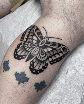 Butterfly American Traditional Tattoo Trad Tattoo Black and Grey by Erik Jeffrey. Death Proof Tattoo and Barber. Whistler, BC. Pemberton, Squamish, Vancouver Canada. Tattoo Studio. Tattoo Shop. Barber Shop. Tattoo Artist. Professional Services.