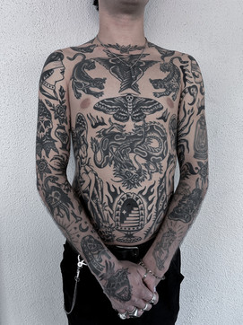 Torso Hand Chest Arm Sleeve American Traditional Tattoo Trad Tattoo Black and Grey by Erik Jeffrey. Death Proof Tattoo and Barber. Whistler, BC. Pemberton, Squamish, Vancouver Canada. Tattoo Studio. Tattoo Shop. Barber Shop. Tattoo Artist. Professional Services.