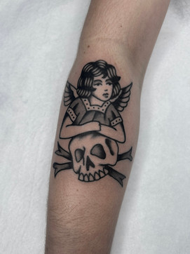 Skull Crossbones Lady Woman Girl Angel American Traditional Tattoo Trad Tattoo Black and Grey by Erik Jeffrey. Death Proof Tattoo and Barber. Whistler, BC. Pemberton, Squamish, Vancouver Canada. Tattoo Studio. Tattoo Shop. Barber Shop. Tattoo Artist. Professional Services.