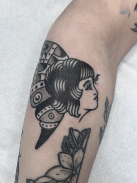 Butterfly Lady Woman American Traditional Tattoo Trad Tattoo Black and Grey by Erik Jeffrey. Death Proof Tattoo and Barber. Whistler, BC. Pemberton, Squamish, Vancouver Canada. Tattoo Studio. Tattoo Shop. Barber Shop. Tattoo Artist. Professional Services.