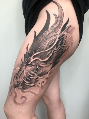 Dragon Hip Thigh Leg Sleeve Fantasy Magic Floral Blackwork Dotwork Feminine Female by Audrey May. Death Proof Tattoo and Barber.  Whistler, BC. Pemberton, Squamish, Vancouver Canada. Tattoo Studio. Tattoo Shop. Barber Shop. Tattoo Artist. Professional Services.  