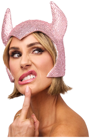 Keltie Knight in a pink Evil Genius horned helmet