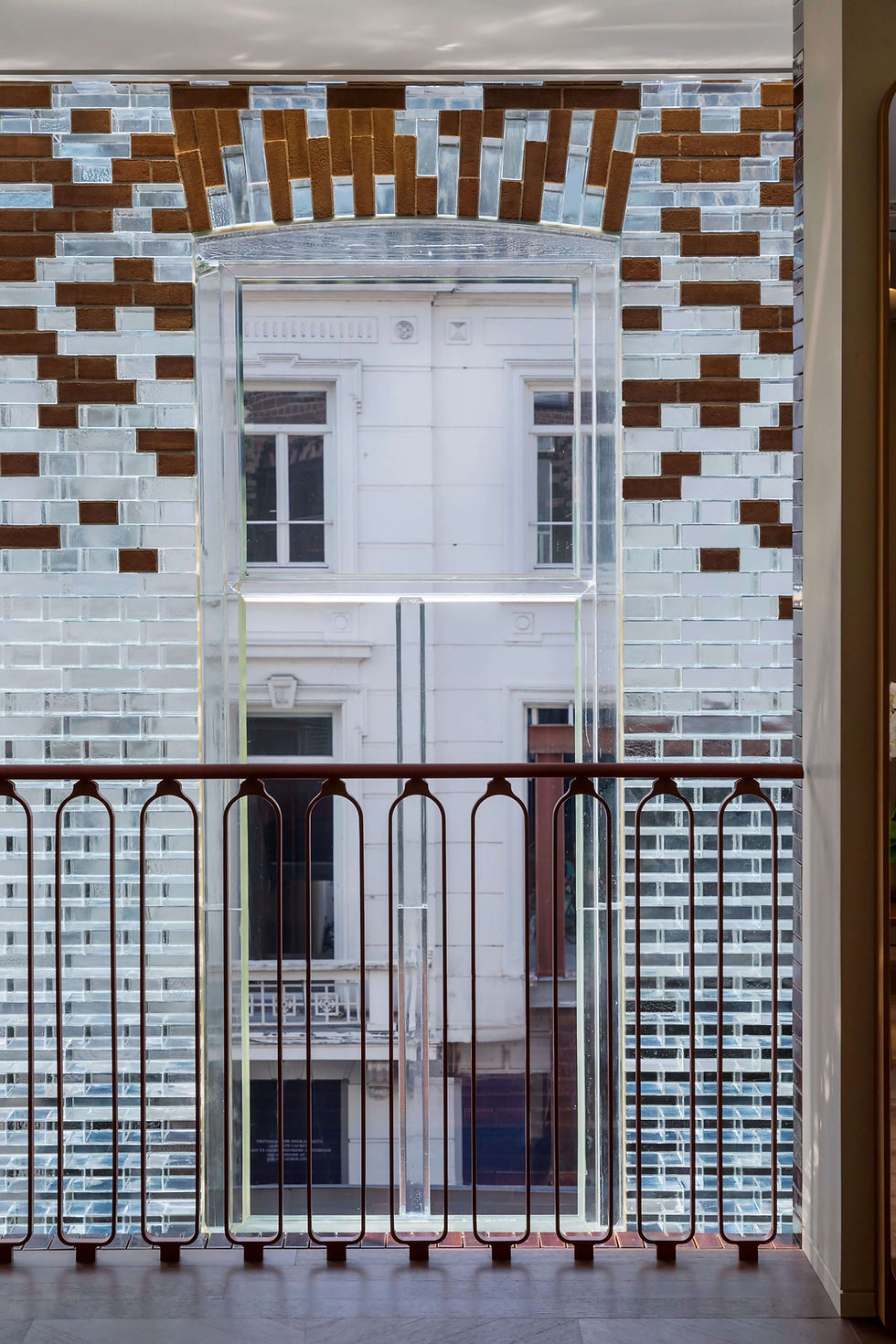 Looking out through the wall of Poesia hand-cast glass bricks at Crystal Houses