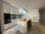 A glimpse of Petersen D91 bricks through the kitchen window. in South Melbourne