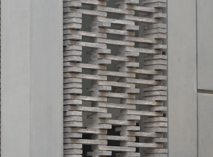 A close up of the Handmade Petersen Kolumba brick screen
