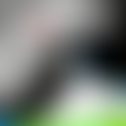 runner in a white nike top wearing dark sunglasses