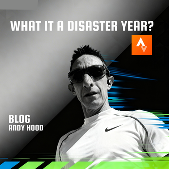 man in running gear and dark sunglasses with the orange strava logo