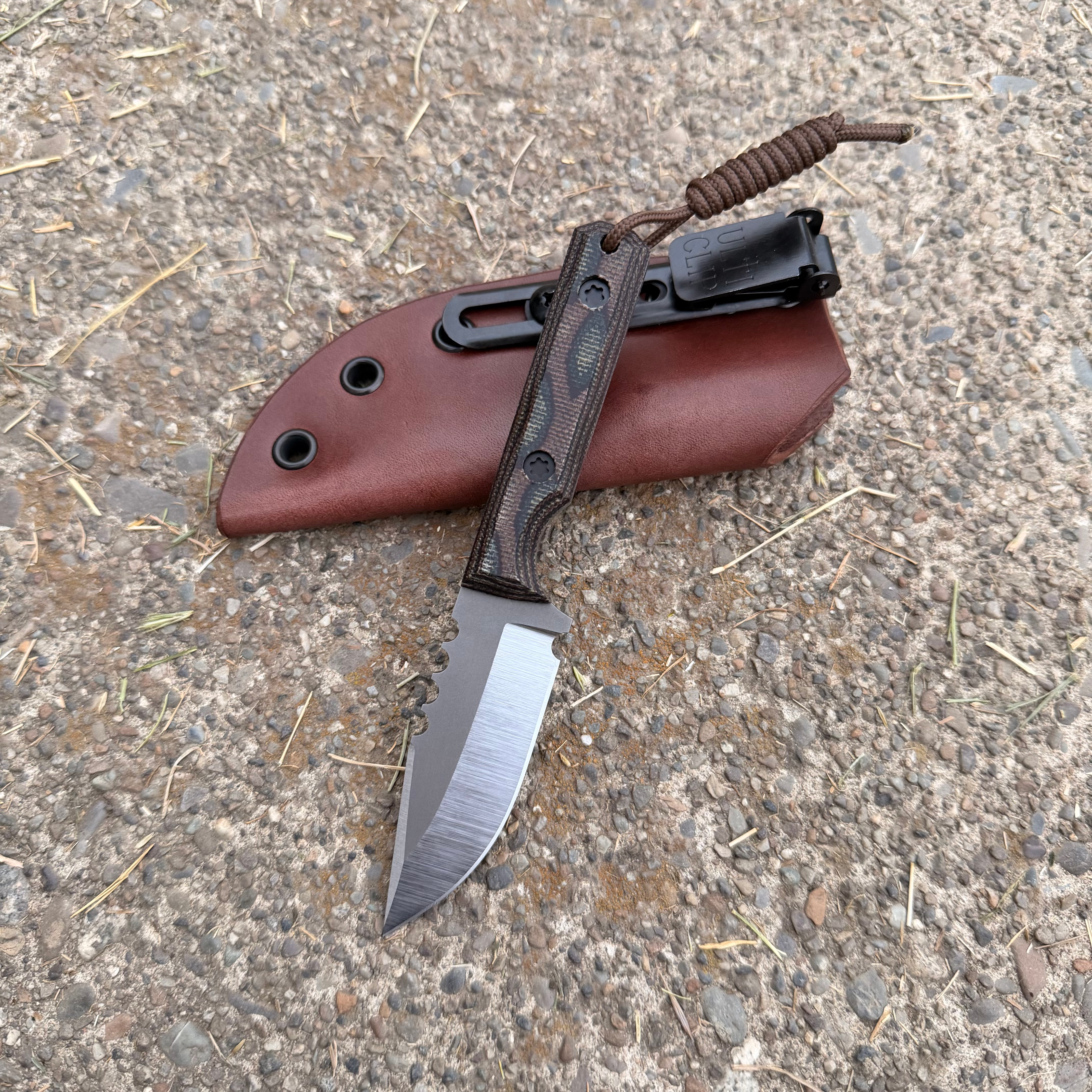 Mini MC in CPM 10V with python micarta and leather sheath