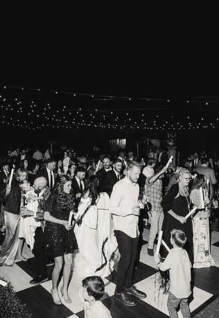 A black and white wedding reception photo of the dance floor at Windwood Equestrian Wedding Venue.