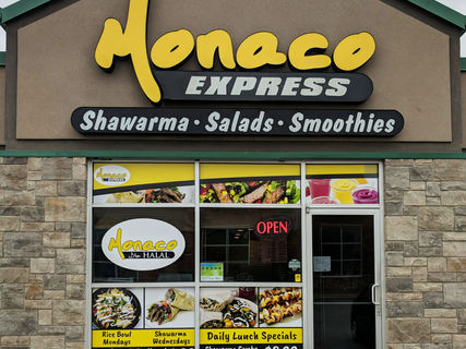 Pro Tint Graphics Signage Bussiness graphics Signs Logos Decals Sticks Labels Local Printing Large Formatt Printing Custom Designs Tint Frost Frosting Security Privacy Commercial window graphics