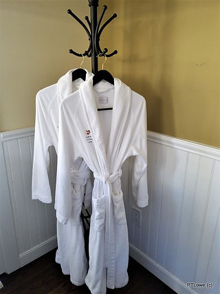 Cozy guest robes in your suite at the Brannan Cottage Inn