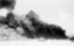 Kabunare squatting on the top of the cliff at Tabiang (National Australia Archives).