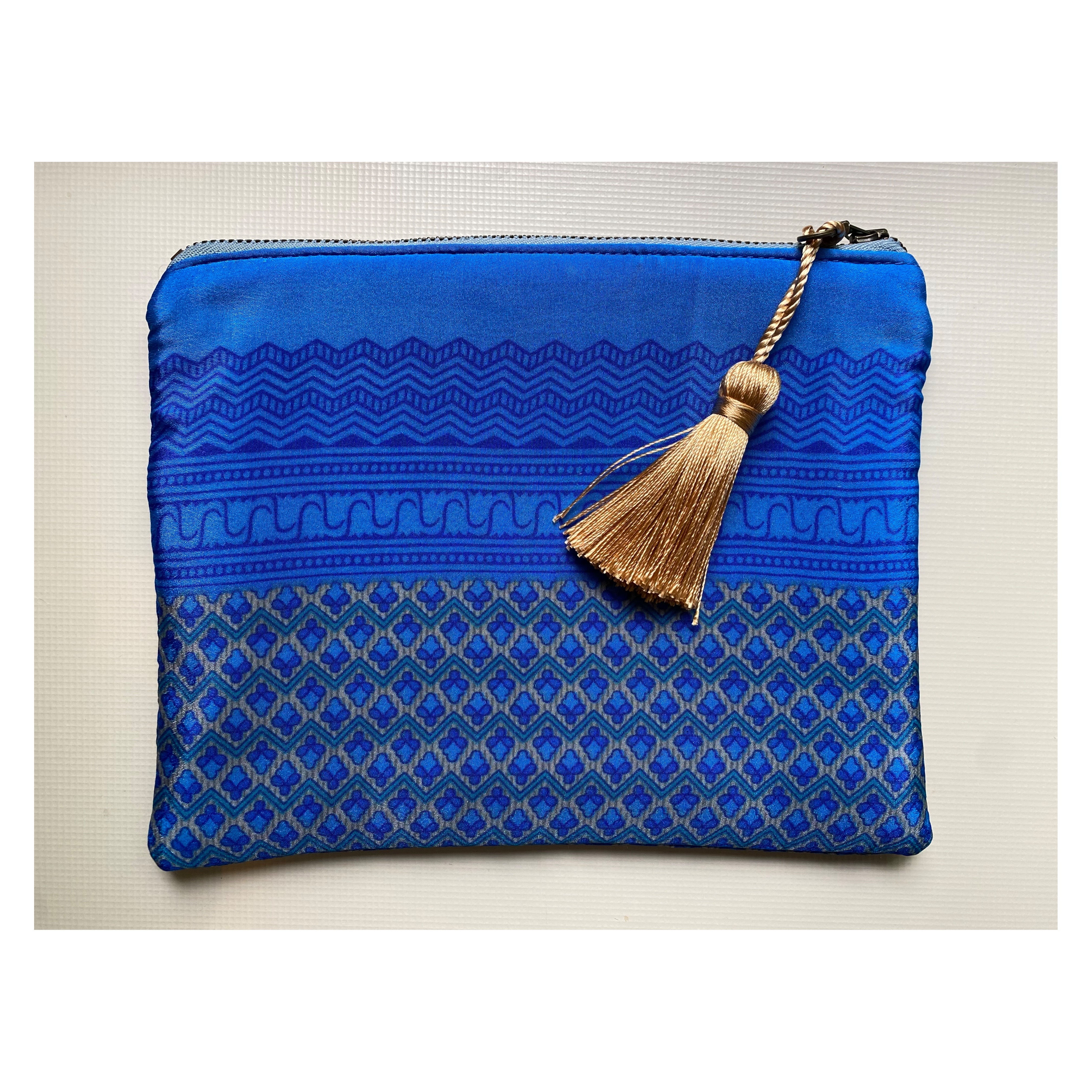 blue silk purse with gold tassel