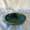 Thumbnail: front  view of gorge salad bowl in various tones of blues and greens over a speckled clay