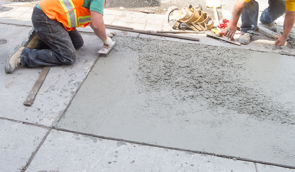 Technicians performing industrial concrete slab repair inside a Texas warehouse