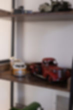 Toy trucks on a shelf