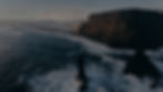 A rocky cliff along the ocean