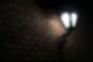 low-angle-shot-of-a-lighting-wall-lamp-outside-on-2025-02-02-13-56-03-utc.jpg