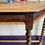 Thumbnail: Wood tones on a vintage barleytwist leg console table.