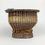 Thumbnail: Back view of woven basket with lighter band and wooden accent