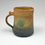 Thumbnail: Rust, black and tan mug by artists Jeff and Donna Tousley