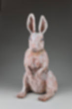 light terra cotta and white clay rabbit sculpture