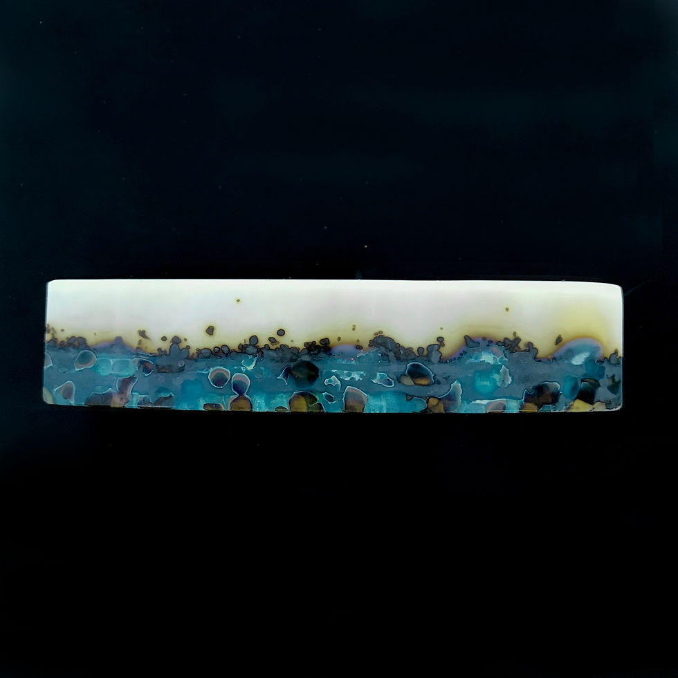 Thumbnail: Black background highlights teal, ivory and amber crushed glass