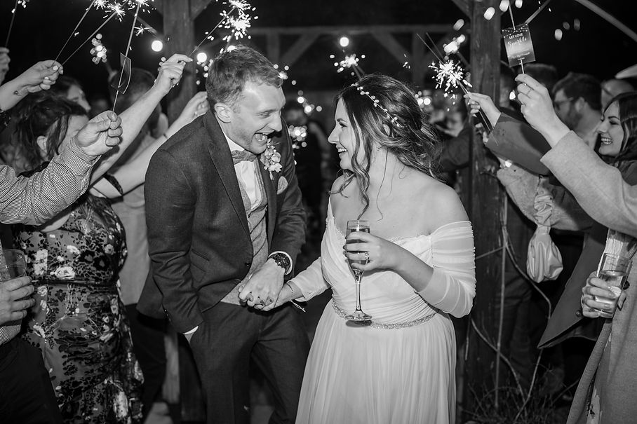 Bride and groom sparkler exit at Fron Farm Yurt Retreat, Whitland, Carmarthenshire, South Wales.