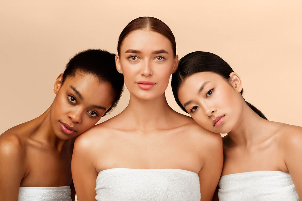 three-girls-wrapped-in-towels-posing-over-beige-ba-2025-03-18-19-20-50-utc.jpg