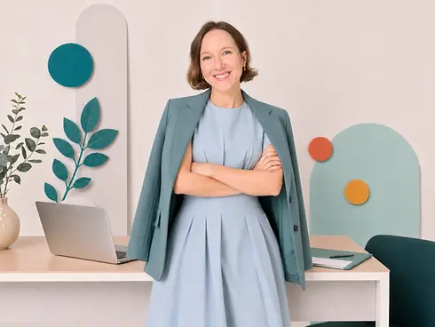hero woman in blue dress founder.webp