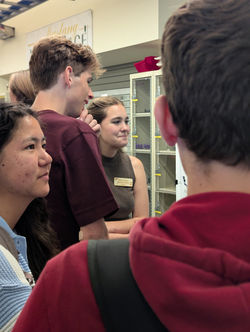 Maddy telling students about her muppet