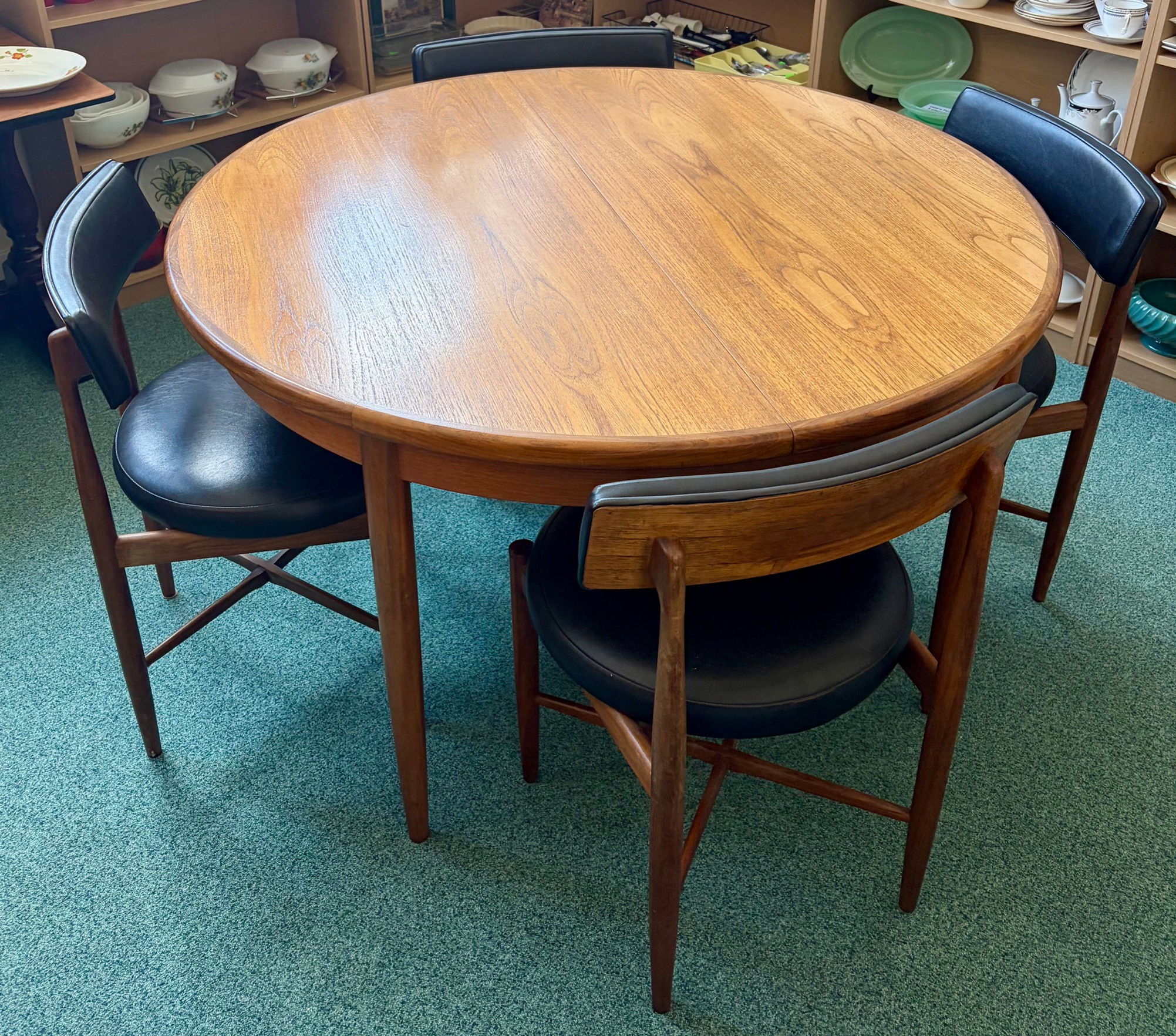 G Plan Fresco Teak Round Extending Table with 4 Black Padded Chairs