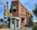 Photo of entrance to Sun Studio with large guitar hanging over the door.