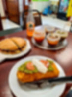 Photo of Mexican food on table inside restaurant.