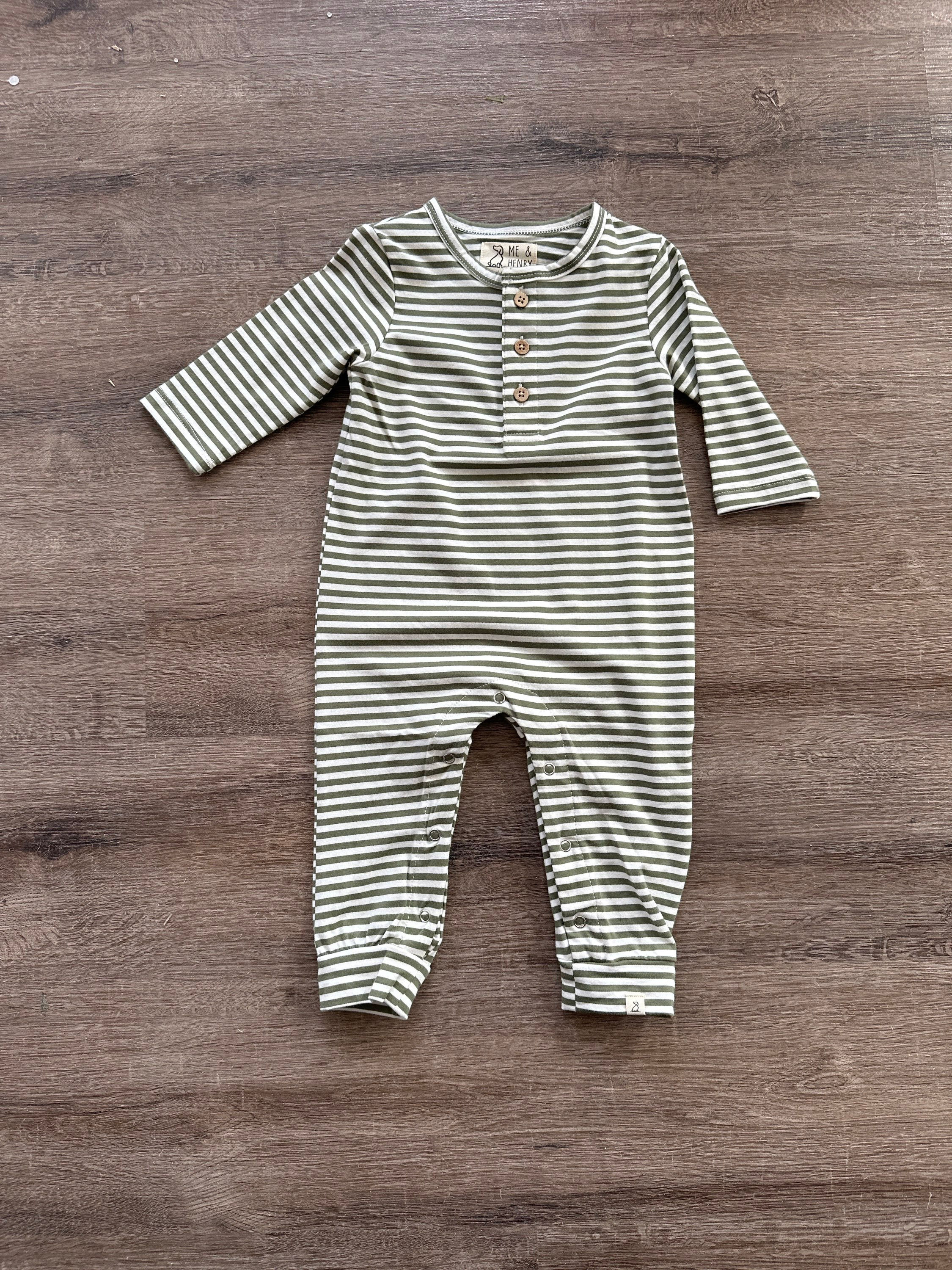 White playsuit has olive stripes and Henley button placket