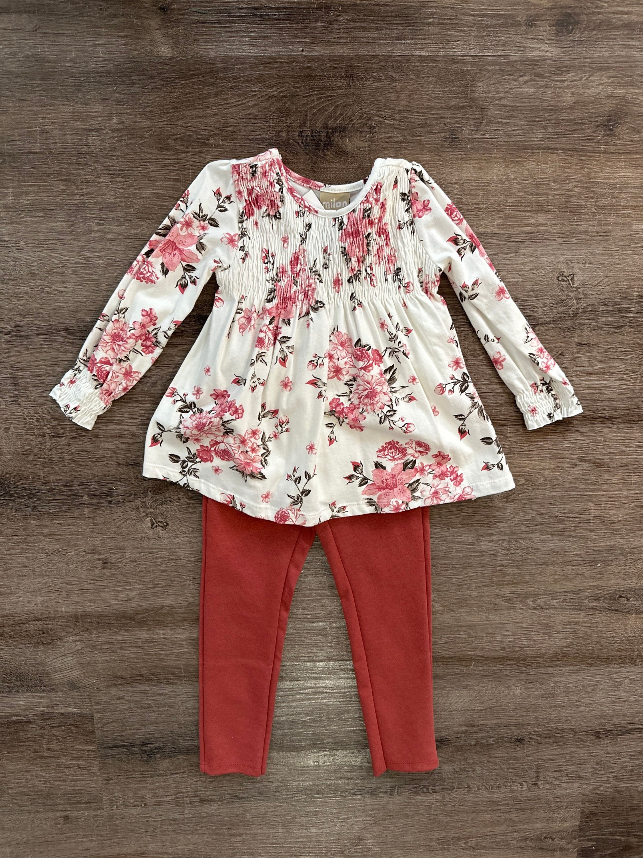 Smocked swing top and soft rust colored jean